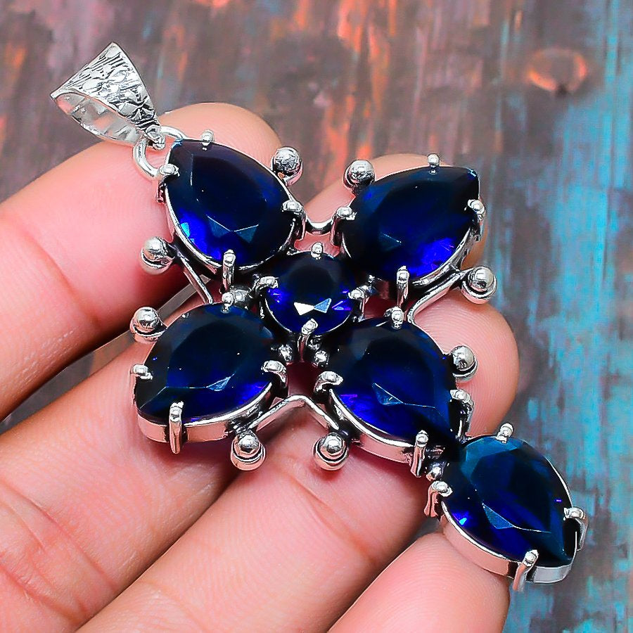 Seraphic Grace – Sapphire Silver Cross Pendant