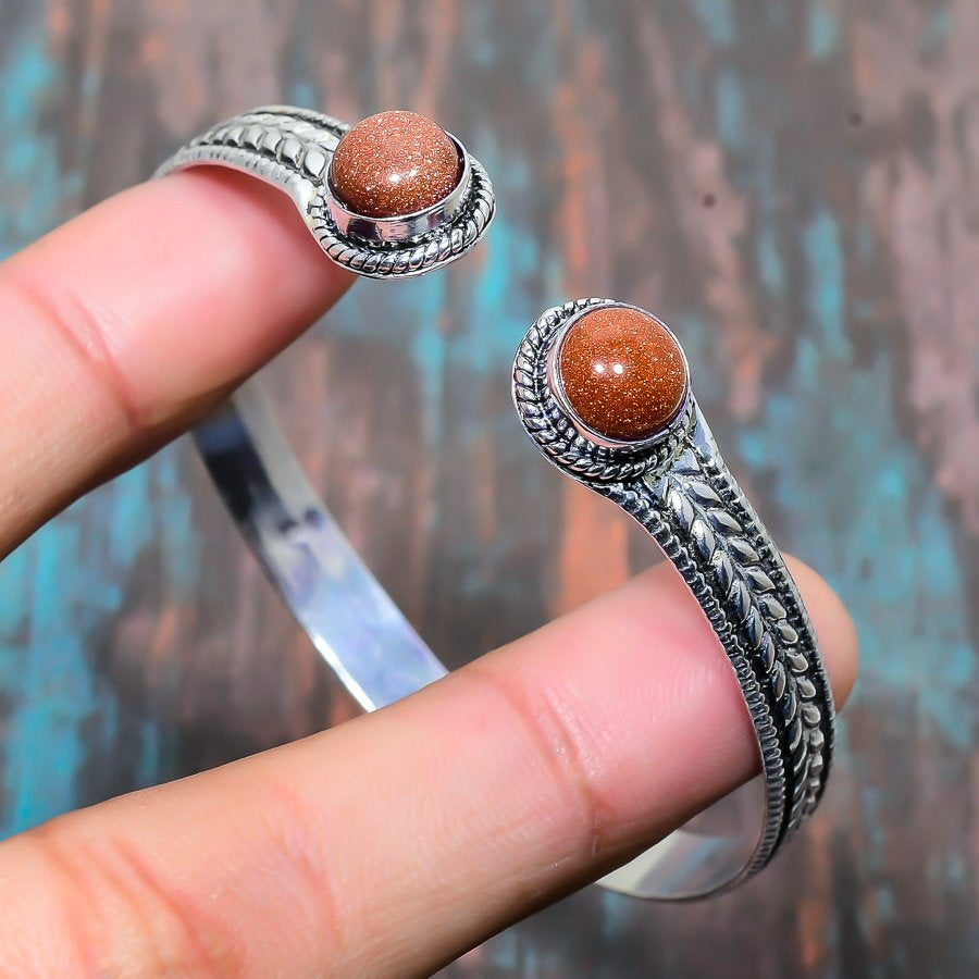 Sunlit Embrace – Handcrafted Sunstone Silver Cuff