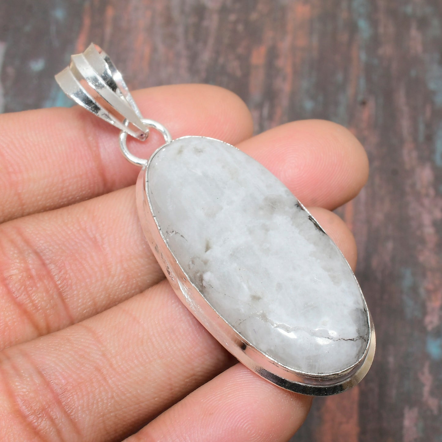 Seraphine’s Glow – White Stone & Sterling Silver Pendant