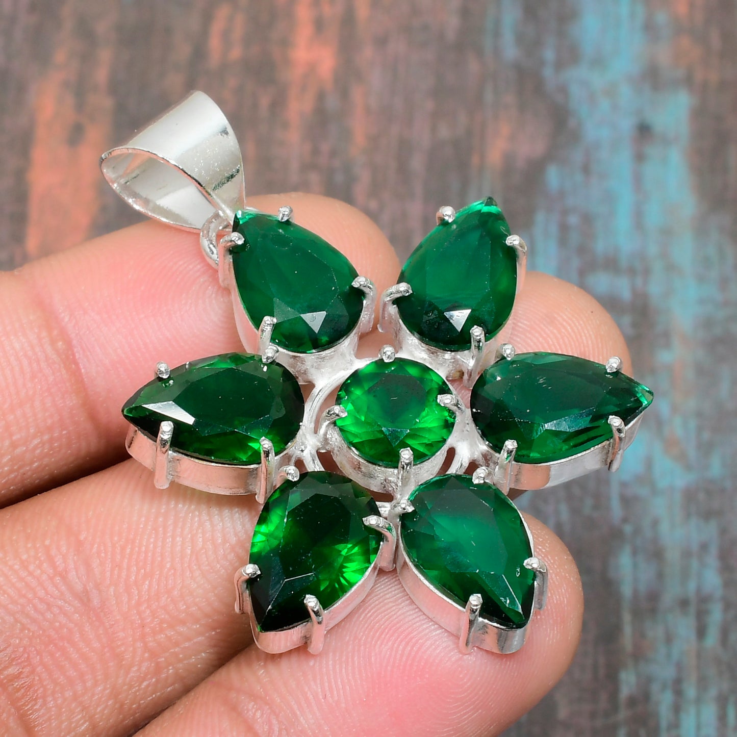 Emerald Blossom – Silver Floral Pendant