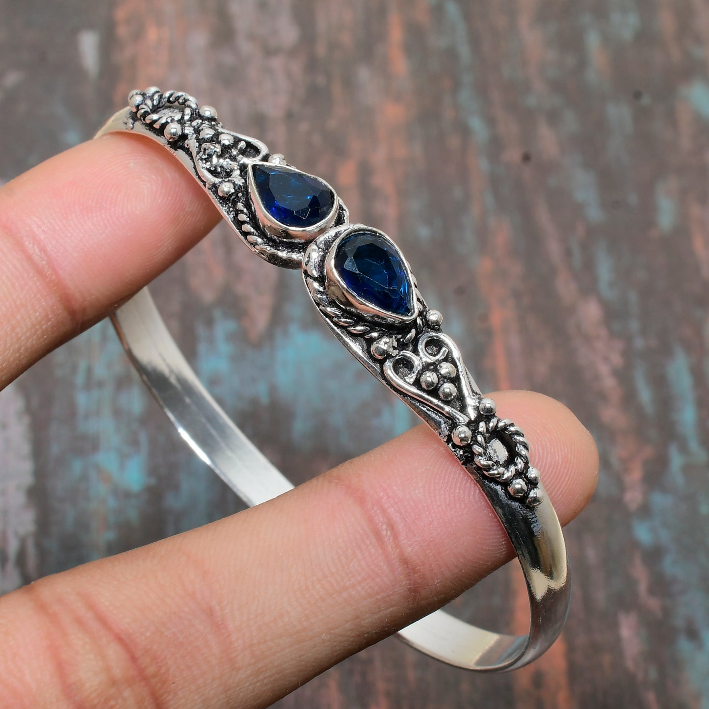 Serene Azure – Silver Bangle with Blue Gemstones