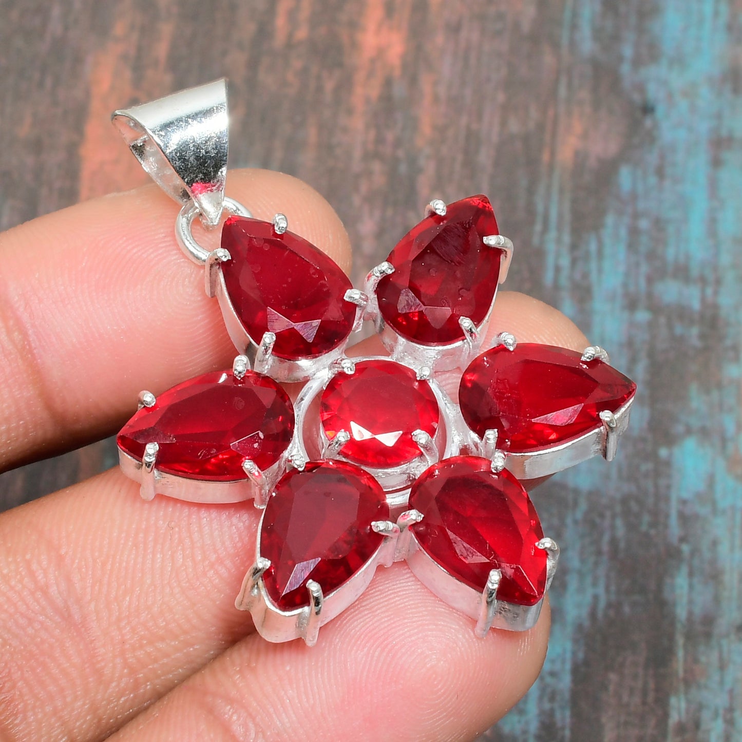 Ruby Blossom Reverie – Sterling Silver Pendant