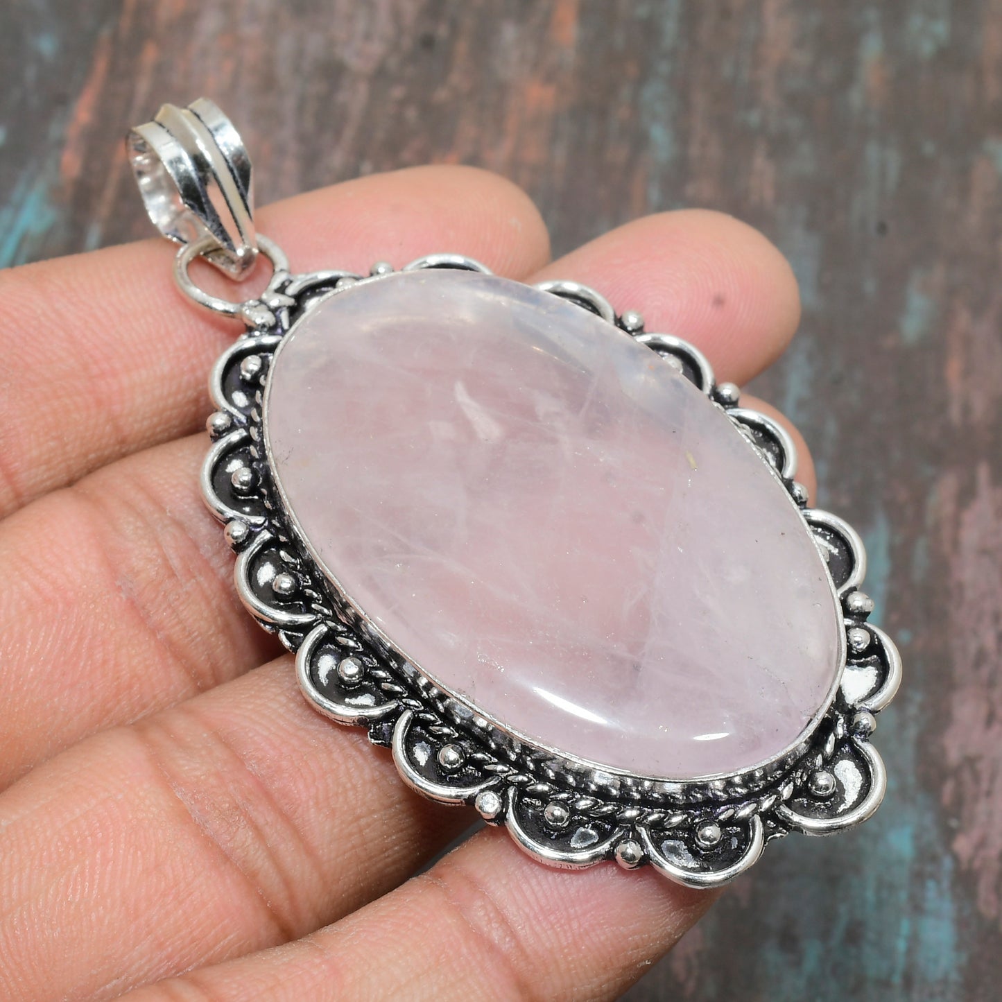 Aurora’s Embrace – Rose Quartz Silver Pendant