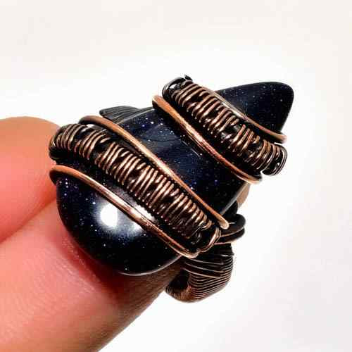 Celestial Embrace – Blue Goldstone Brass Pendant