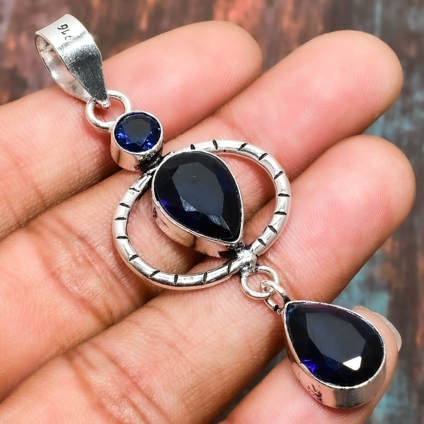 Clarity’s Embrace – Sapphire Silver Pendant