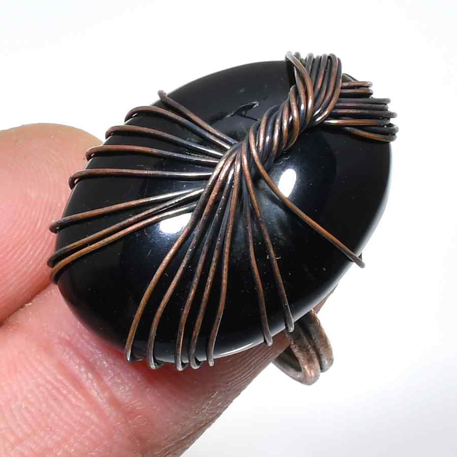 Guardian’s Embrace – Obsidian Copper Ring