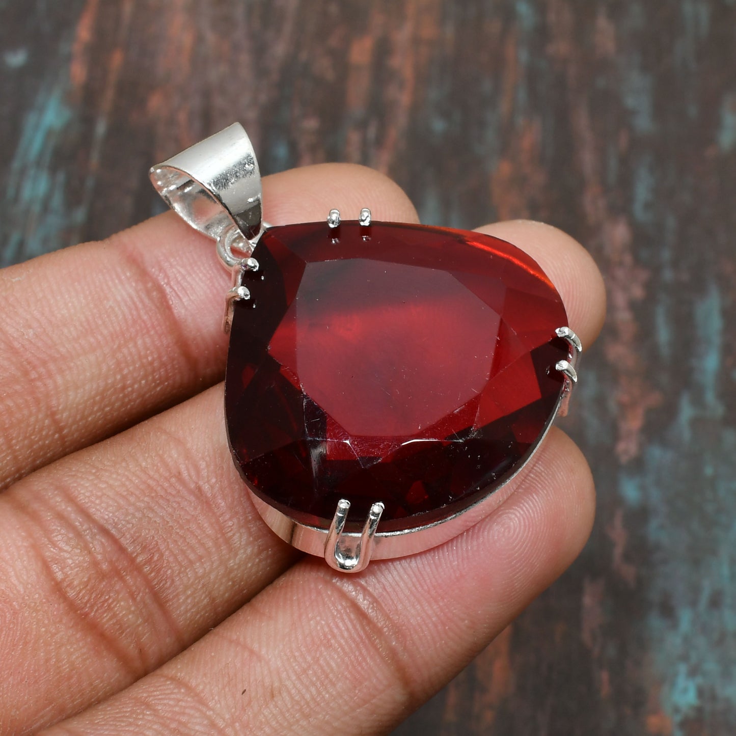 Ember’s Embrace – Sterling Silver Garnet Pendant