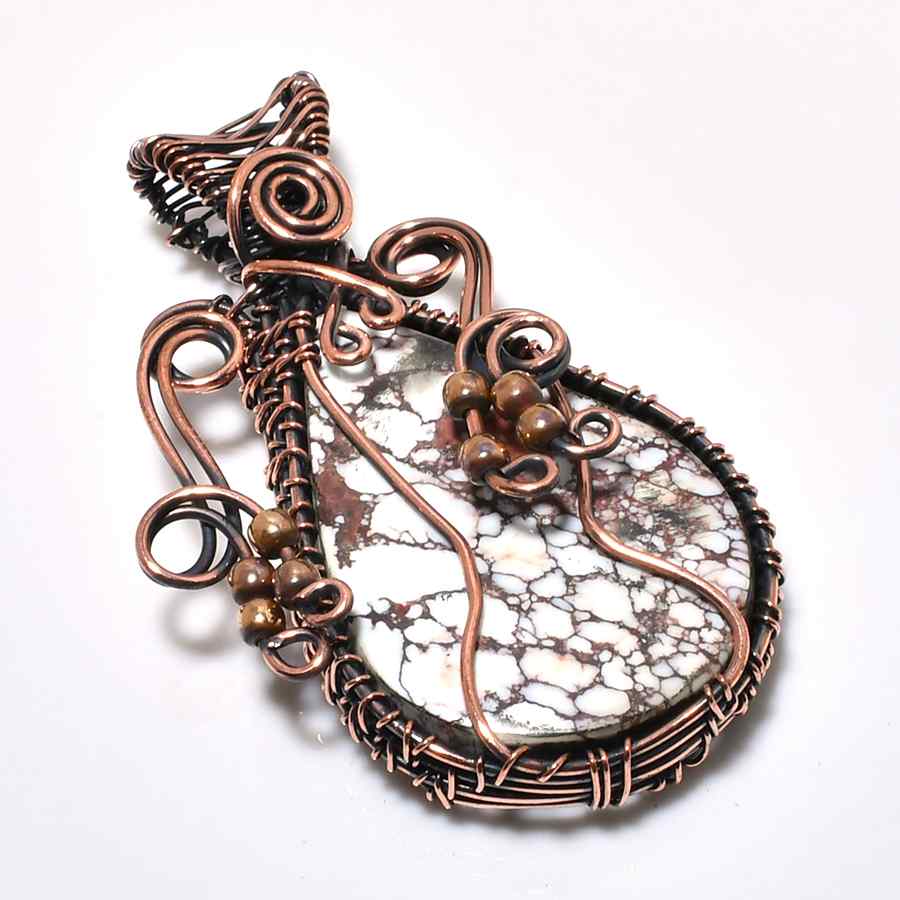 Serenity’s Spiral – Calming Stone Copper Pendant