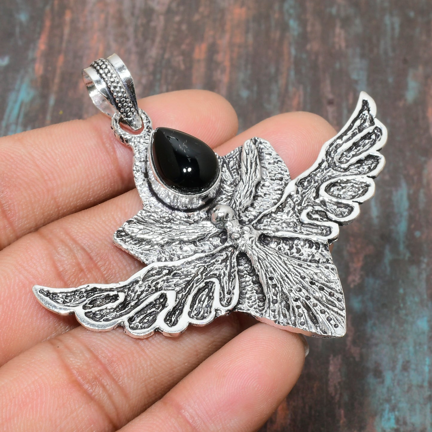 Guardian's Wing – Black Onyx Silver Pendant