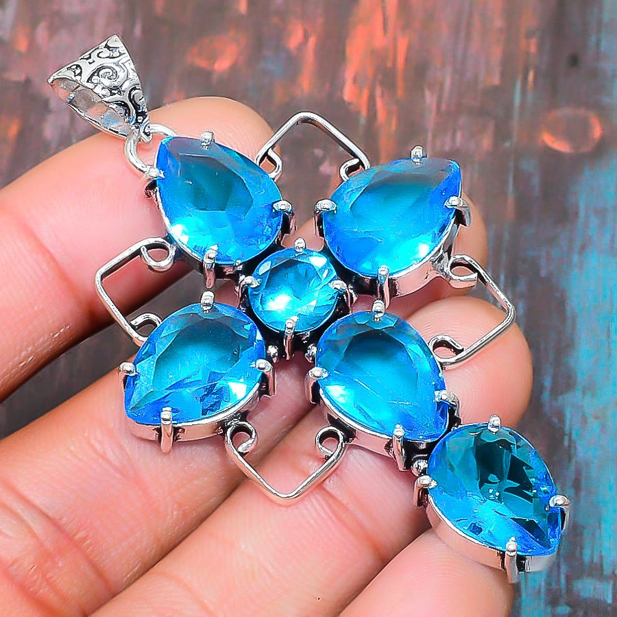 Azura Cross – Sterling Silver Blue Topaz Pendant