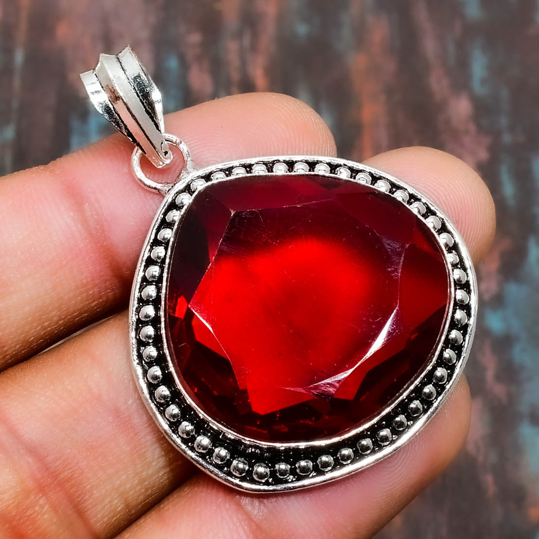 Scarlet Embrace – Silver Ruby Pendant