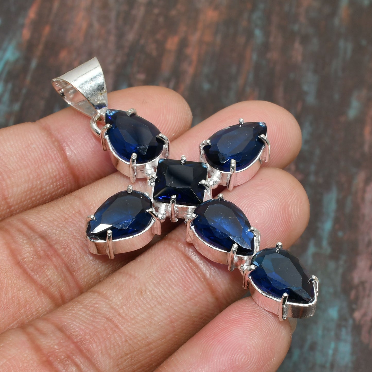 Celeste’s Cross – Blue Sapphire Sterling Pendant