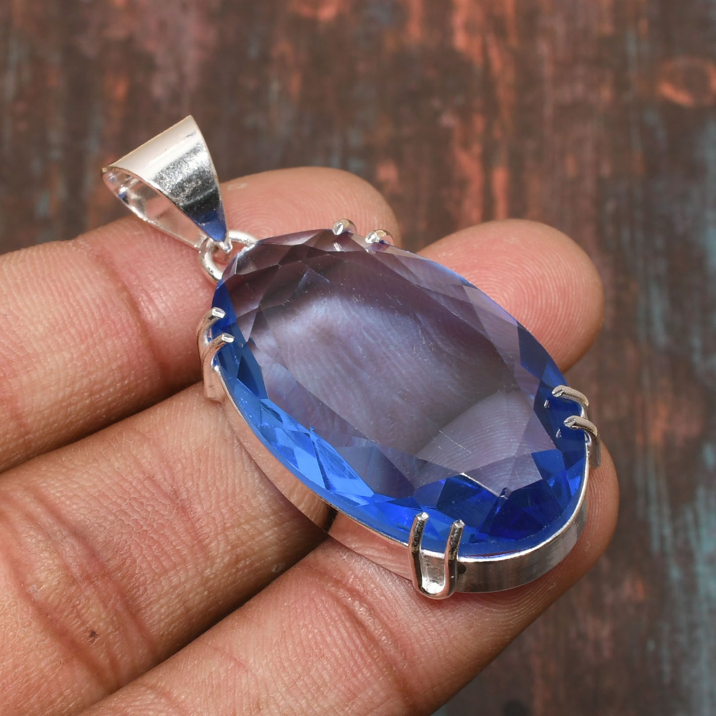 Aurora’s Serenity – Blue Sapphire Silver Pendant