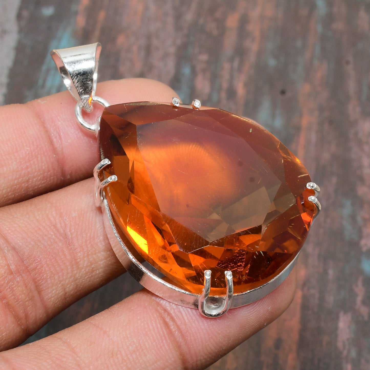 Sunlit Spark – Polished Silver Sunstone Pendant