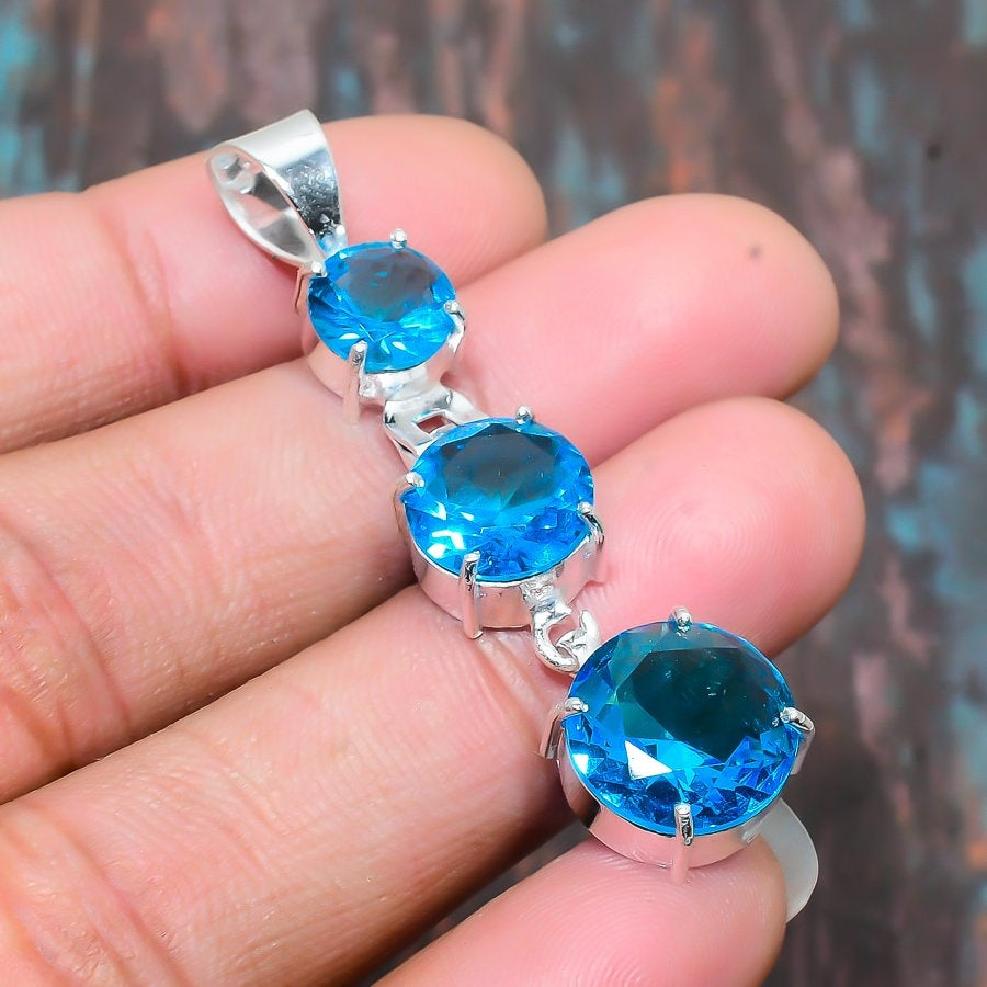 Ocean’s Embrace – Blue Topaz Sterling Silver Pendant