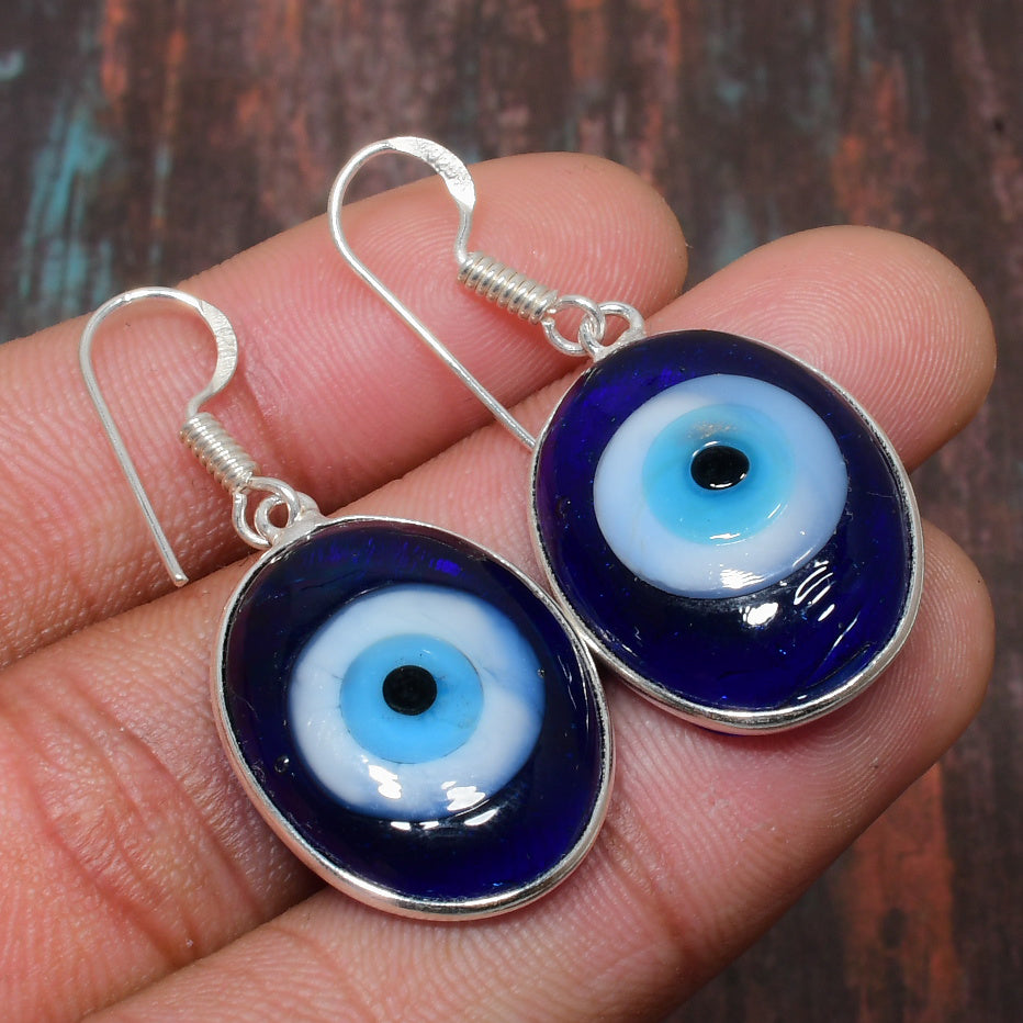 Azure Aegis – Silver & Blue Glass Eye Earrings