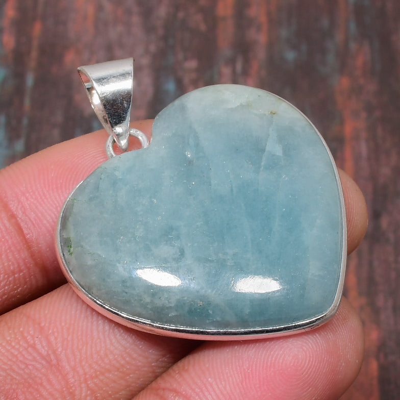 Ocean’s Embrace – Aquamarine Heart Pendant