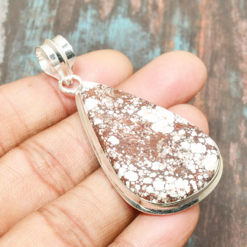 River’s Embrace – Silver Riverstone Pendant