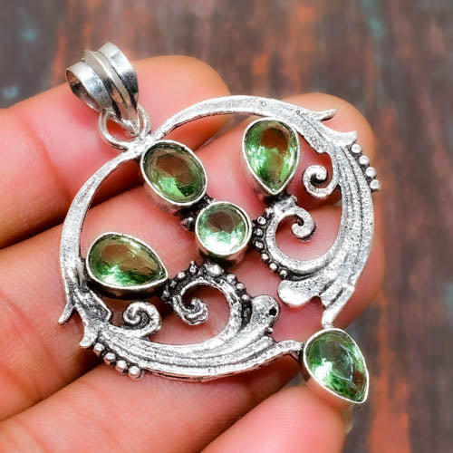 Peridot Blossom – Sterling Silver Renewal Pendant