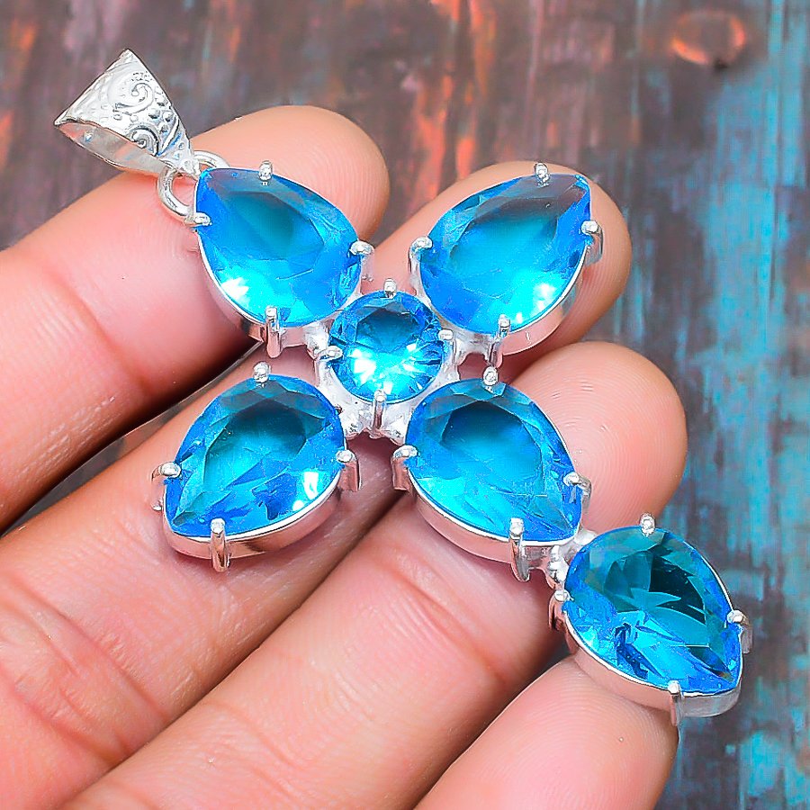 Azure Grace – Blue Topaz Sterling Silver Cross Pendant