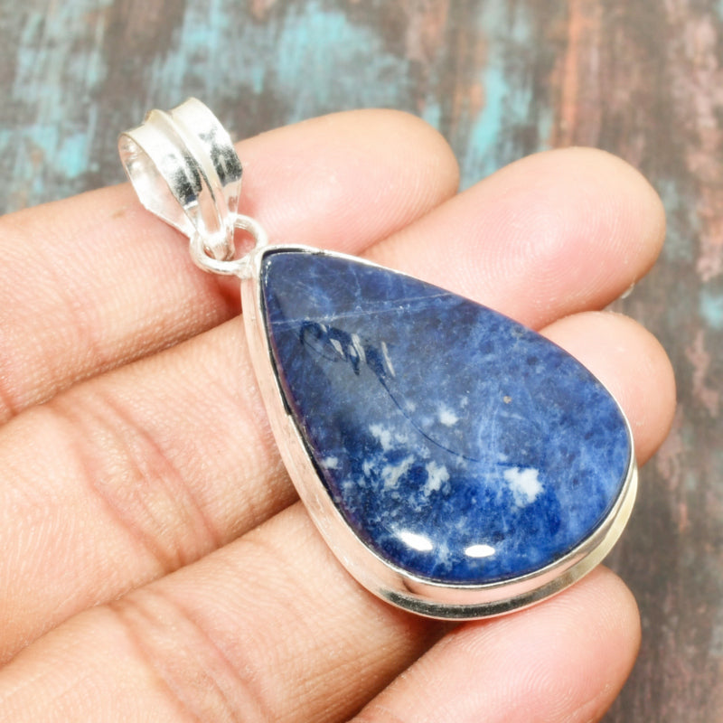 Ocean’s Embrace – Sterling Sodalite Pendant