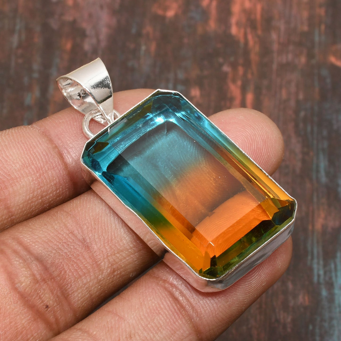 Aurora’s Balance – Blue-Orange Fluorite Pendant