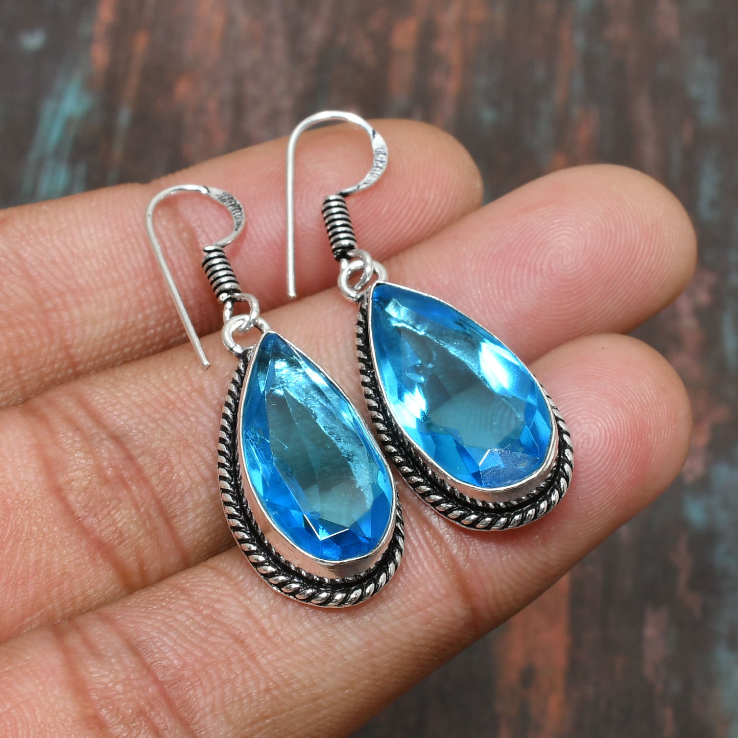 Ocean’s Embrace – Teardrop Blue Topaz Earrings