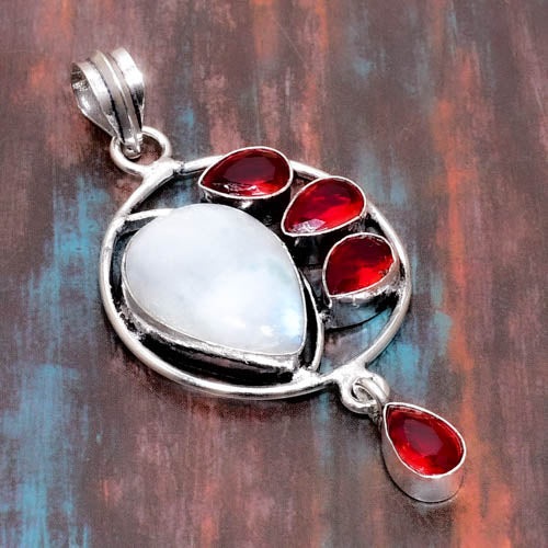 Luna’s Embrace – Moonstone & Garnet Pendant