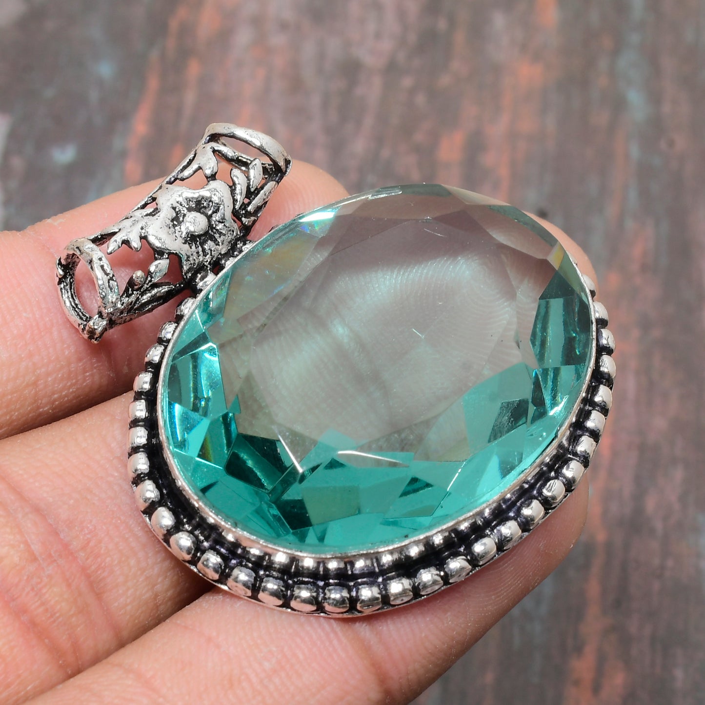 Ocean’s Embrace – Aquamarine Silver Pendant