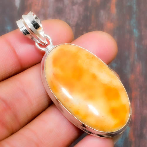 Solara’s Glow – Amber Silver Pendant
