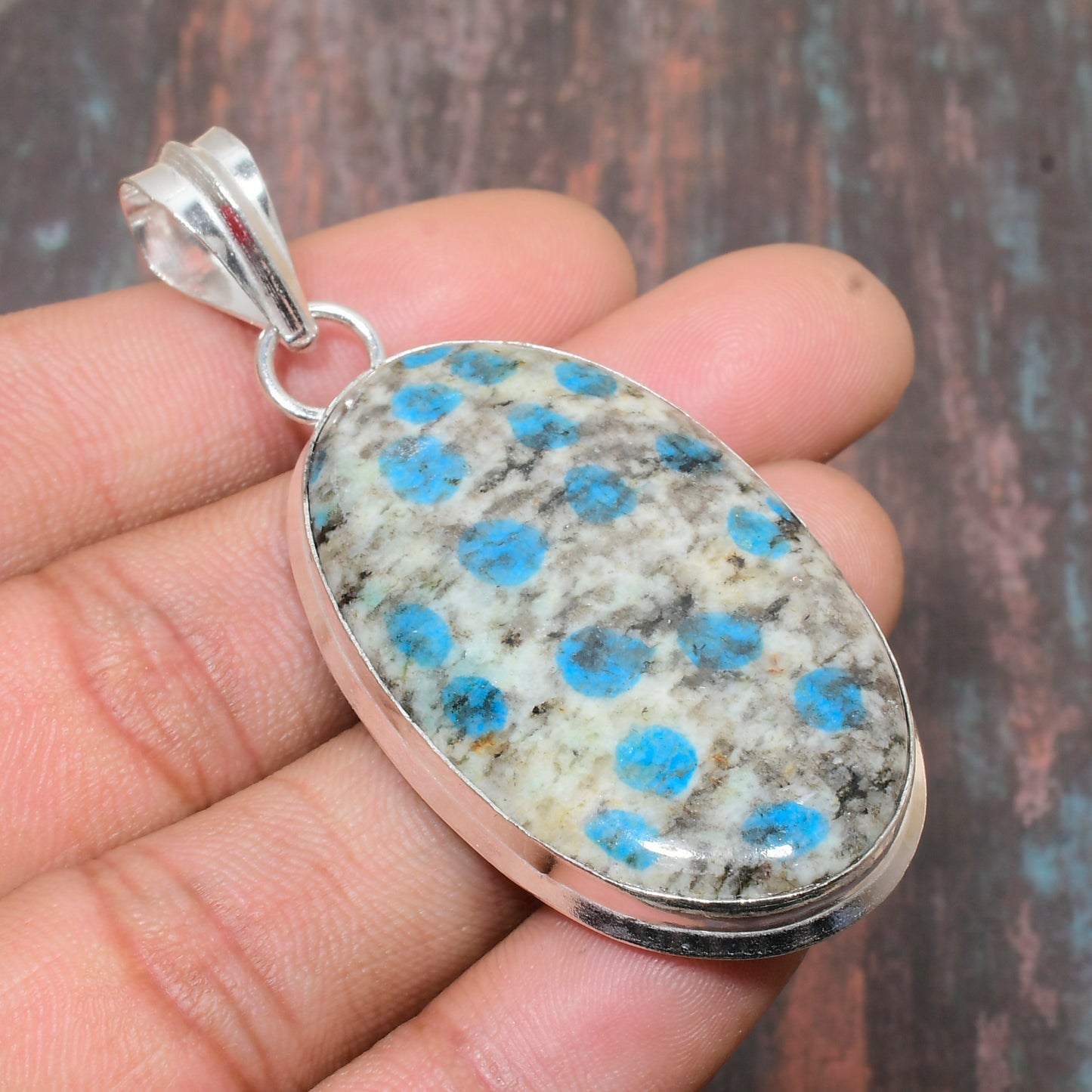 Ocean’s Embrace – Turquoise Sterling Silver Pendant