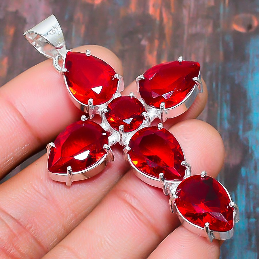 Ruby Valor – Sterling Silver Cross Pendant