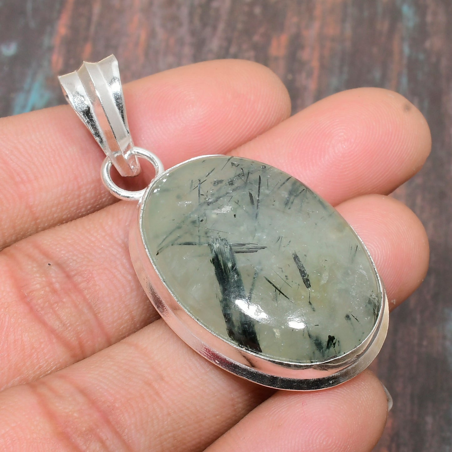Gaia’s Embrace – Green Tourmaline Sterling Silver Pendant