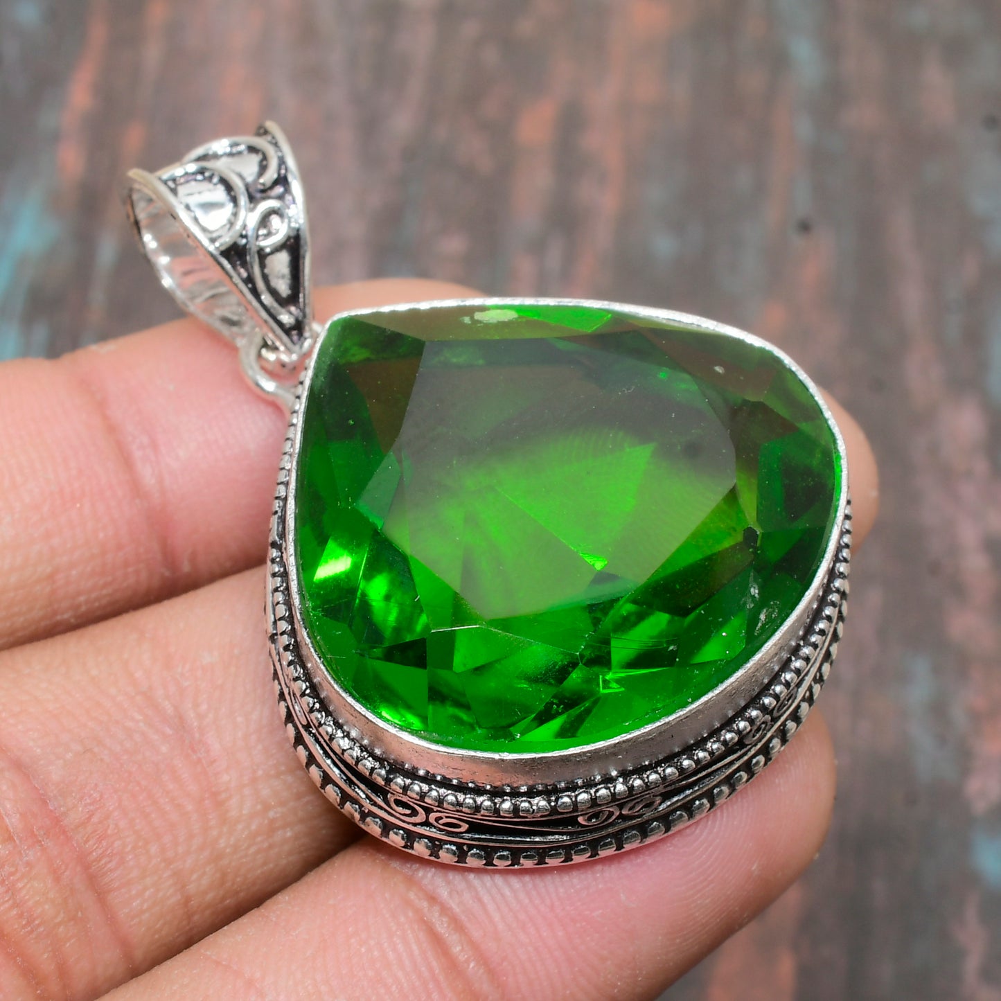 Isadora’s Renewal – Emerald & Silver Pendant
