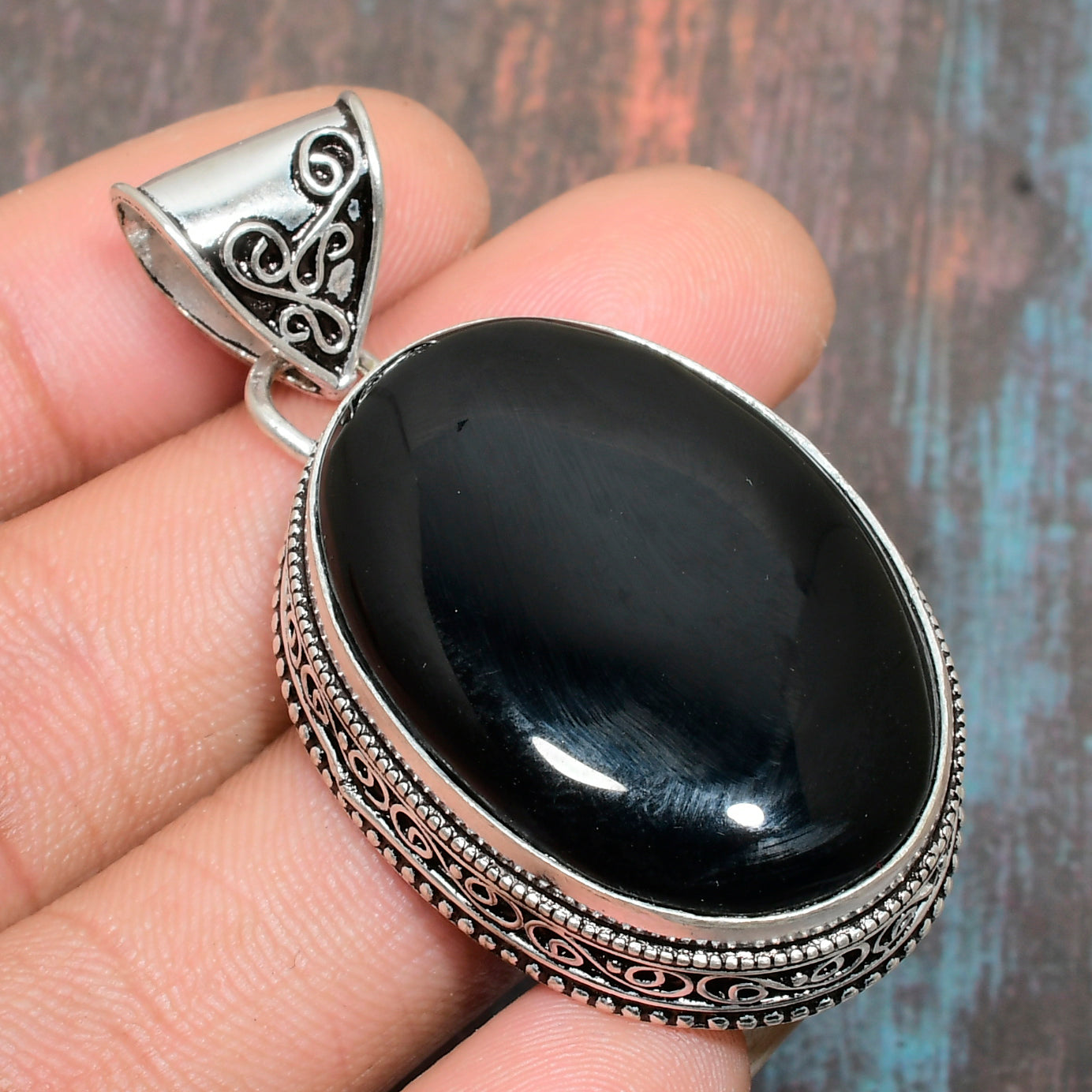 Onyx Sentinel – Handcrafted Silver Pendant
