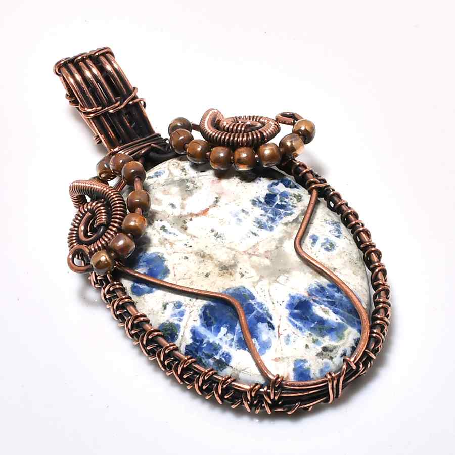 Clarity’s Embrace – Sodalite Copper Pendant