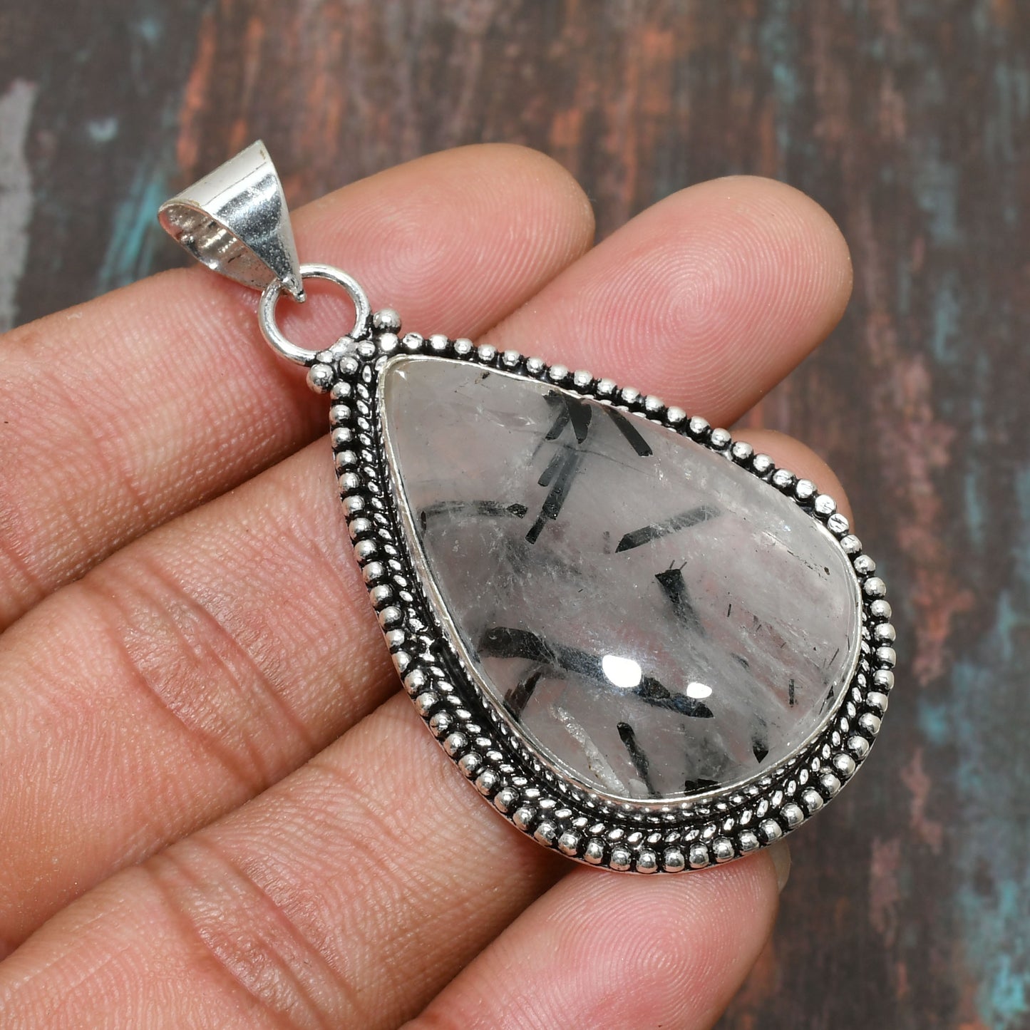 Aurora’s Silk – Rutilated Quartz Silver Pendant