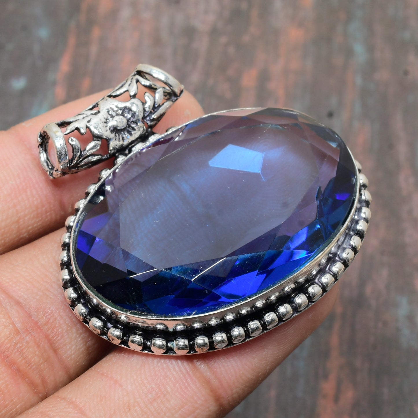 Majestic Sapphire Embrace – Sterling Silver Filigree Pendant