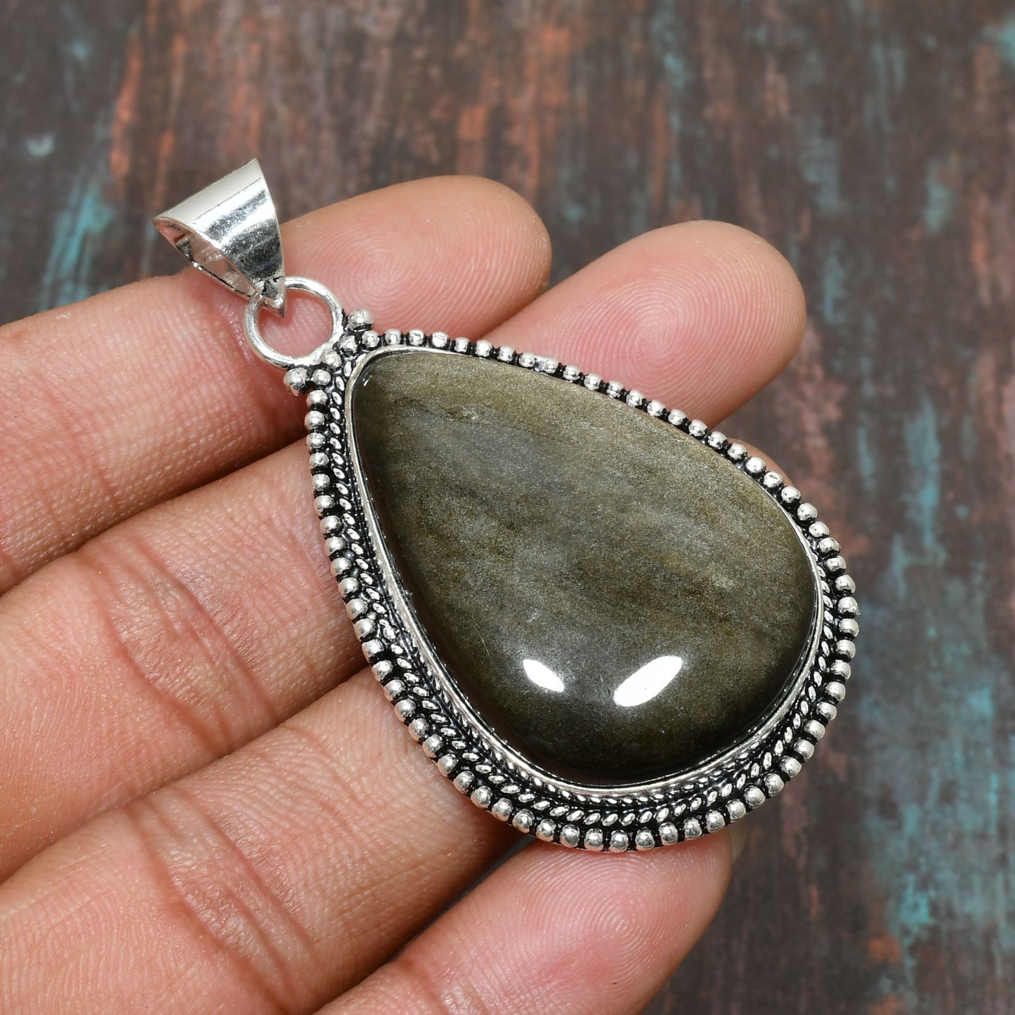 Stormy Elegance – Labradorite Silver Pendant