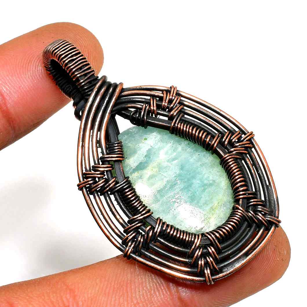 Serenity’s Embrace – Aquamarine Copper Pendant
