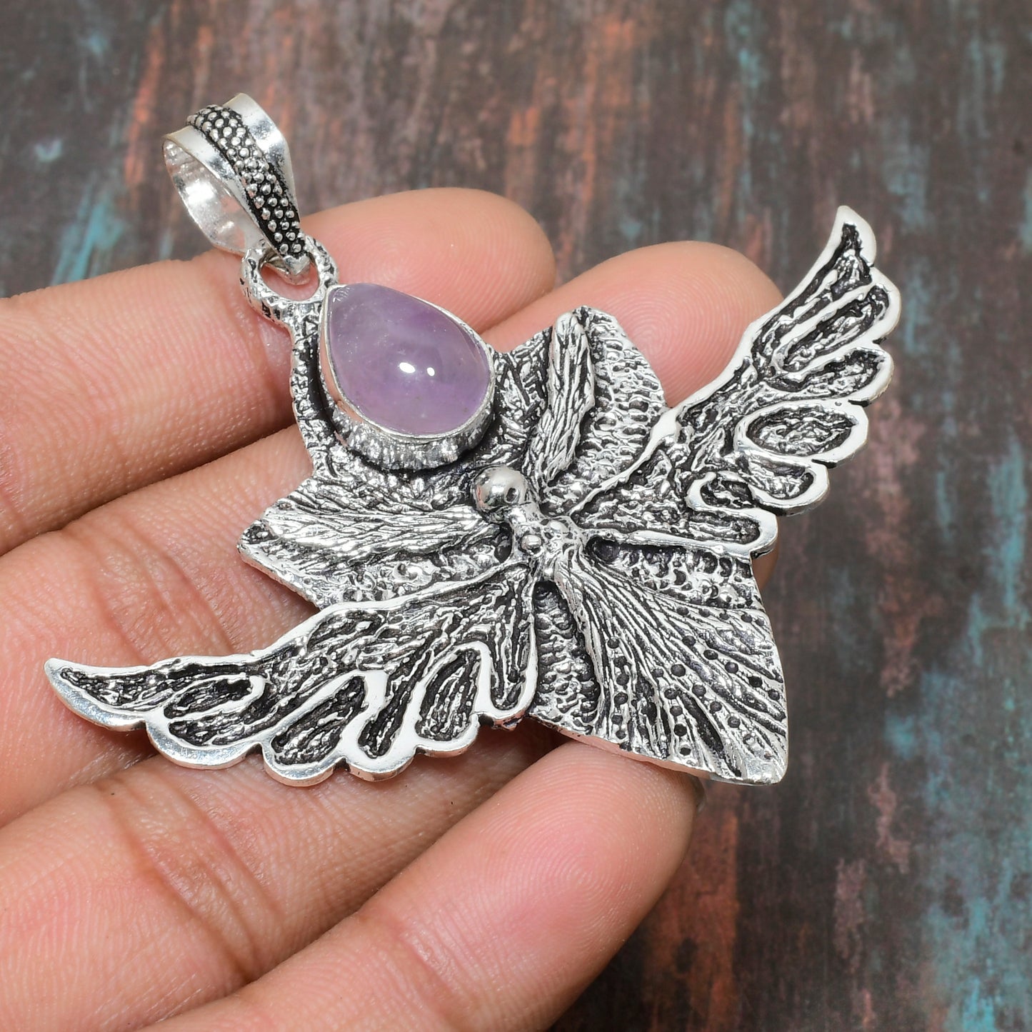 Angel’s Embrace – Amethyst Silver Wing Pendant