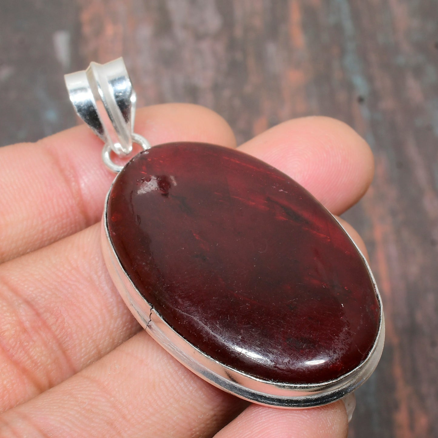 Crimson Courage – Garnet & Sterling Silver Pendant