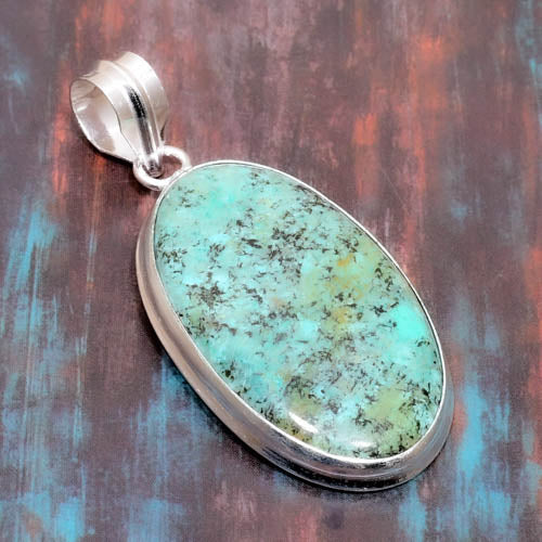 Serenity’s Embrace – Turquoise Sterling Silver Pendant