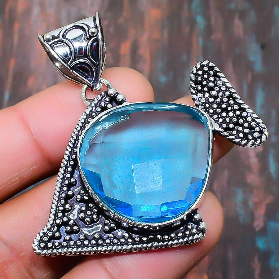 Ocean's Whisper – Blue Topaz & Sterling Silver Pendant