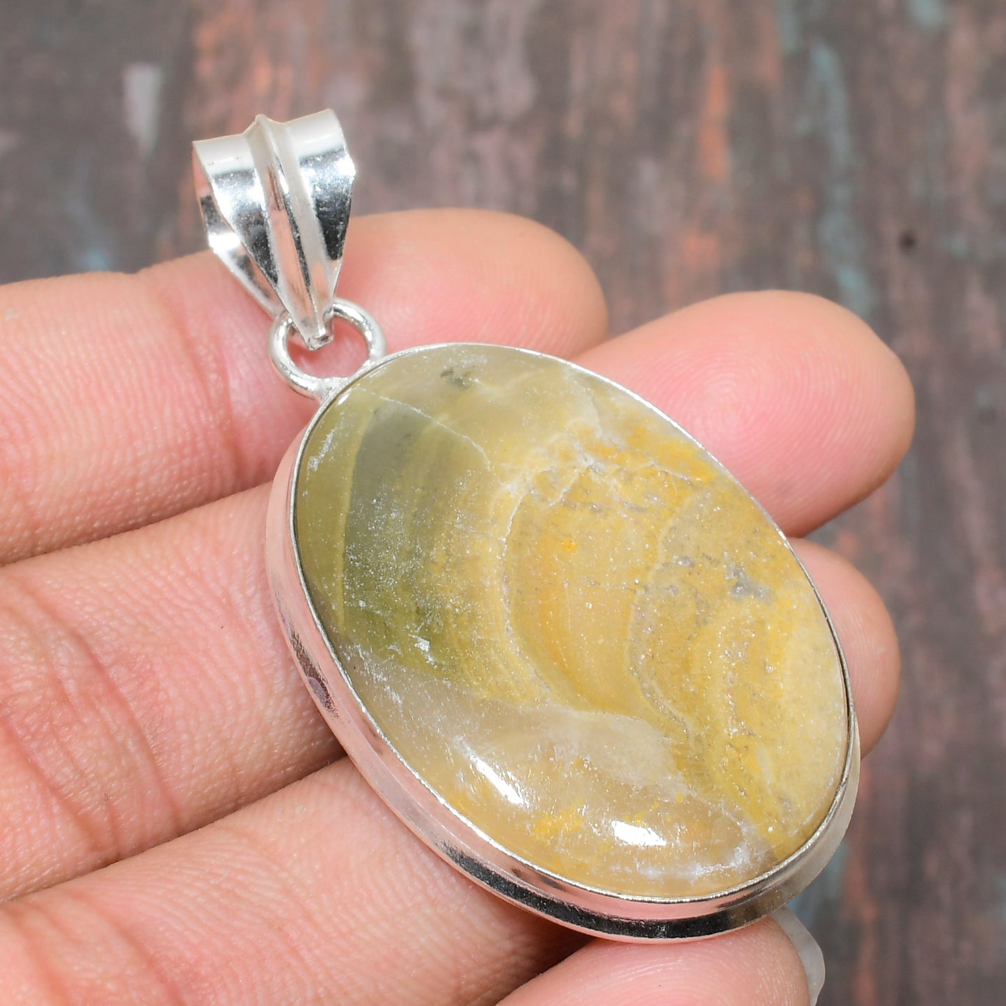 Solara’s Shield – Yellow Tiger’s Eye Stainless Steel Pendant