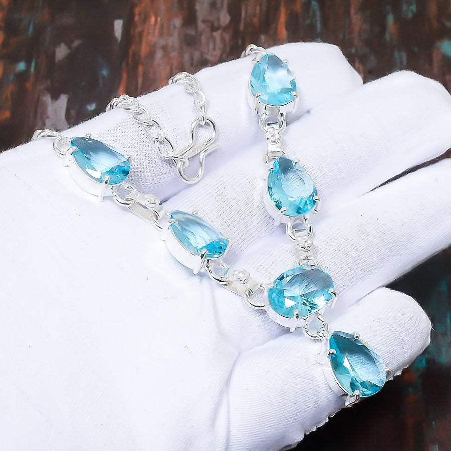 Serenity Embrace – Blue Topaz & Sterling Silver Bracelet