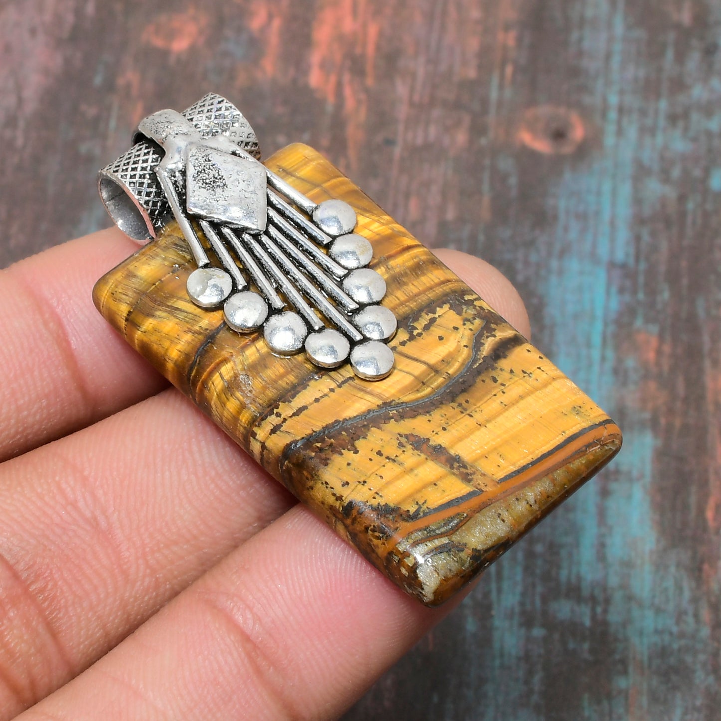Guardian’s Gleam – Tiger’s Eye Silver Pendant