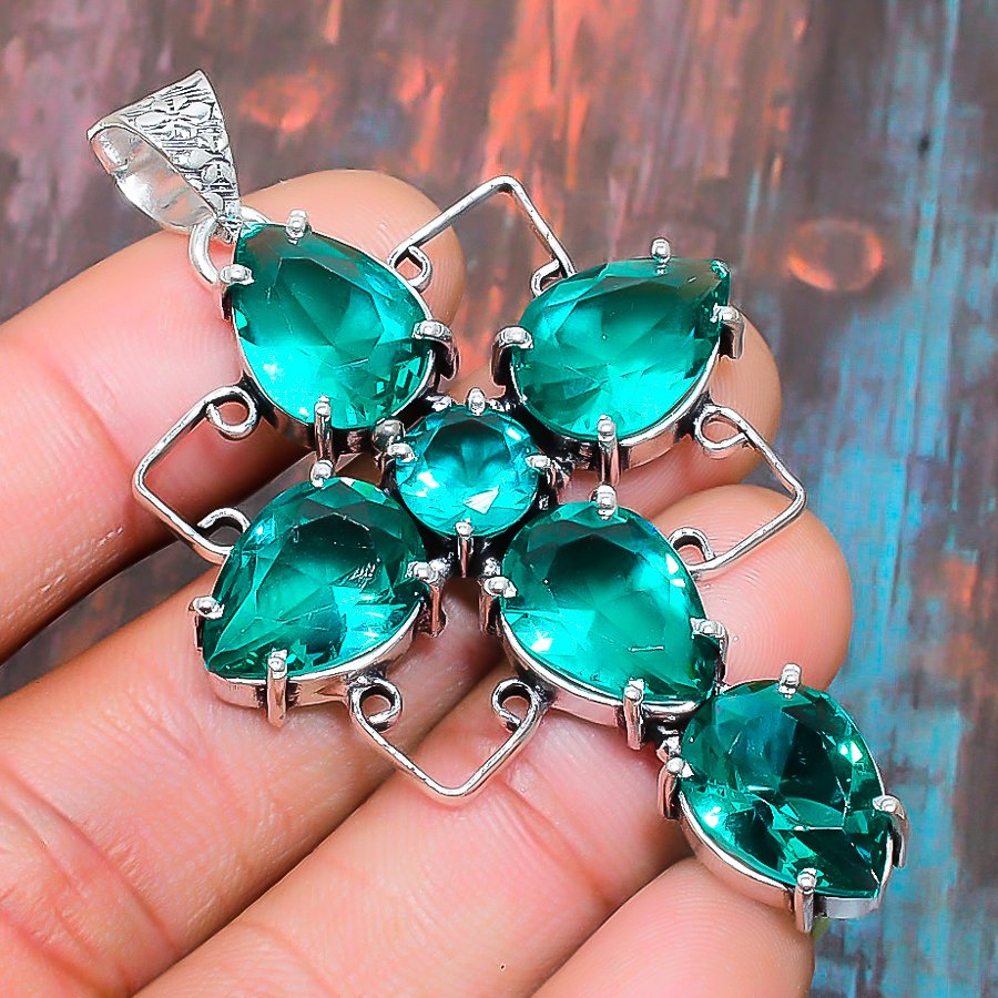 Emerald Aegis – Silver Cross Pendant