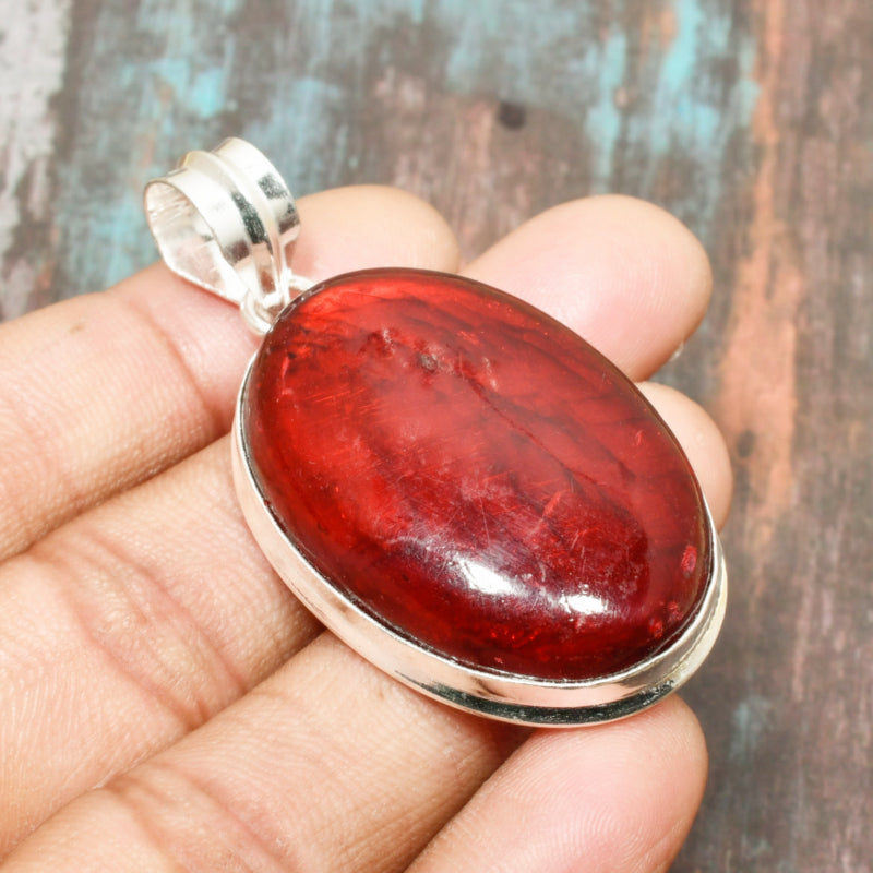 Ember’s Embrace – Sterling Silver Carnelian Pendant
