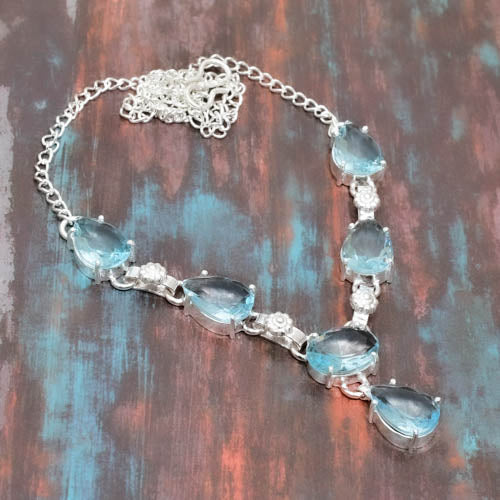 Ocean’s Whisper – Blue Topaz & Sterling Silver Necklace